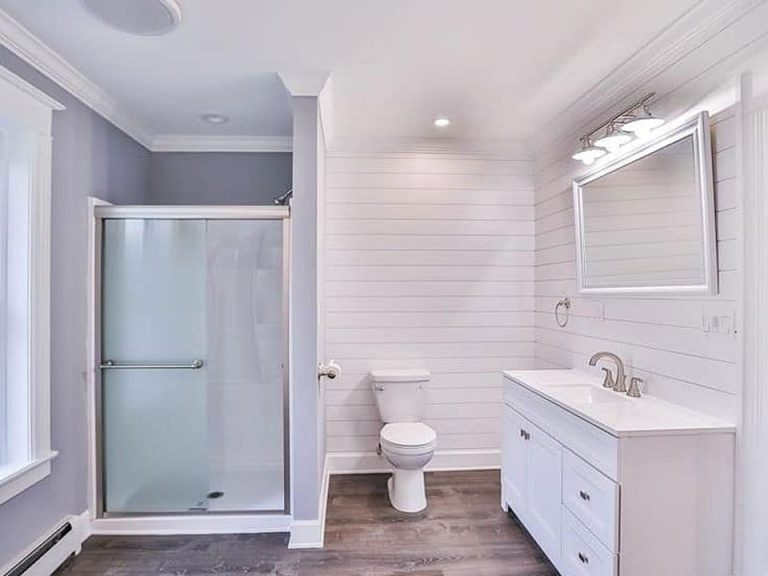 A clean, modern bathroom by Remodel Now